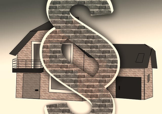 Paragrahenzeichen vor einem Haus